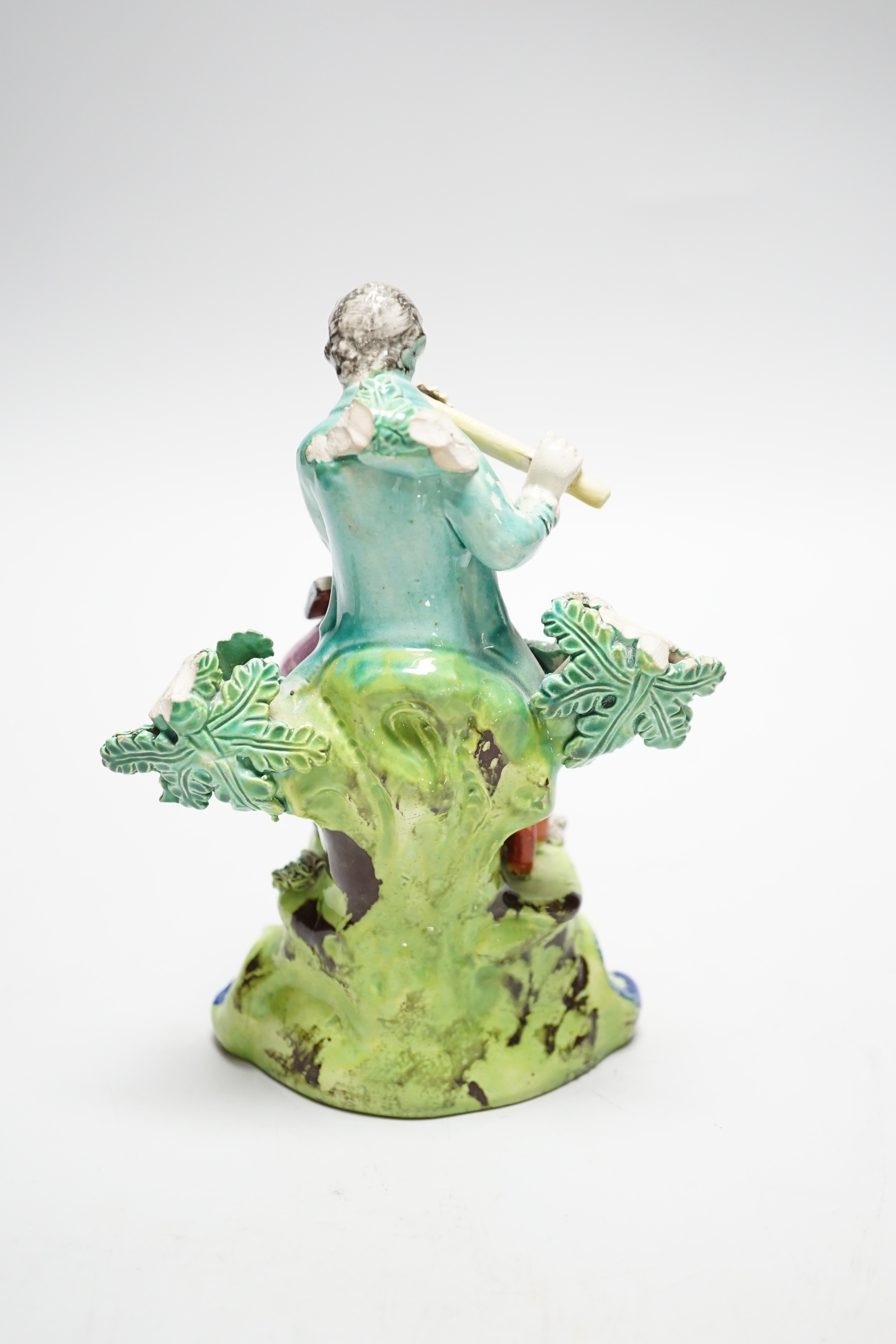 A Staffordshire pearlware musician figure group, c.1820, 16cm
